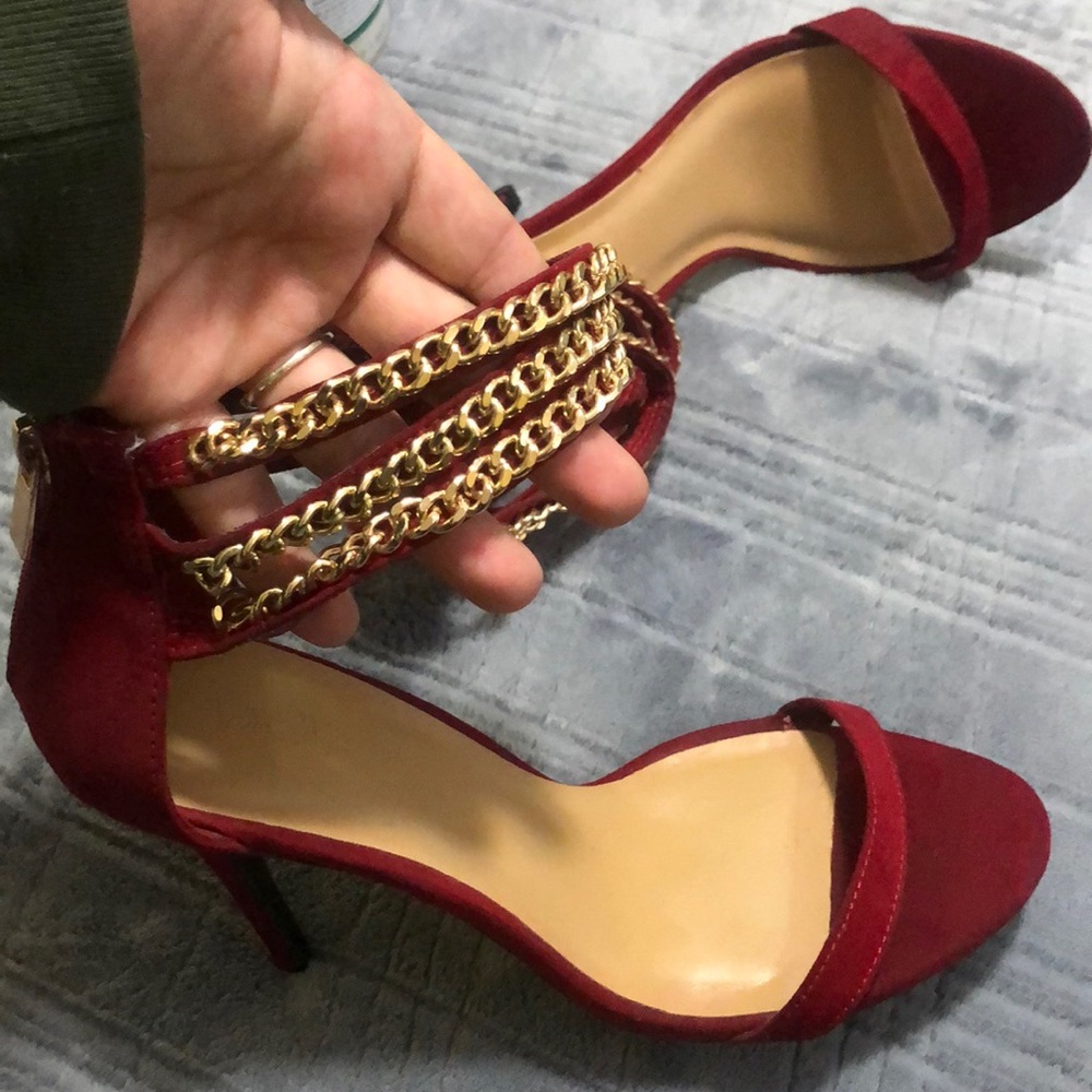 Red high heels with chains